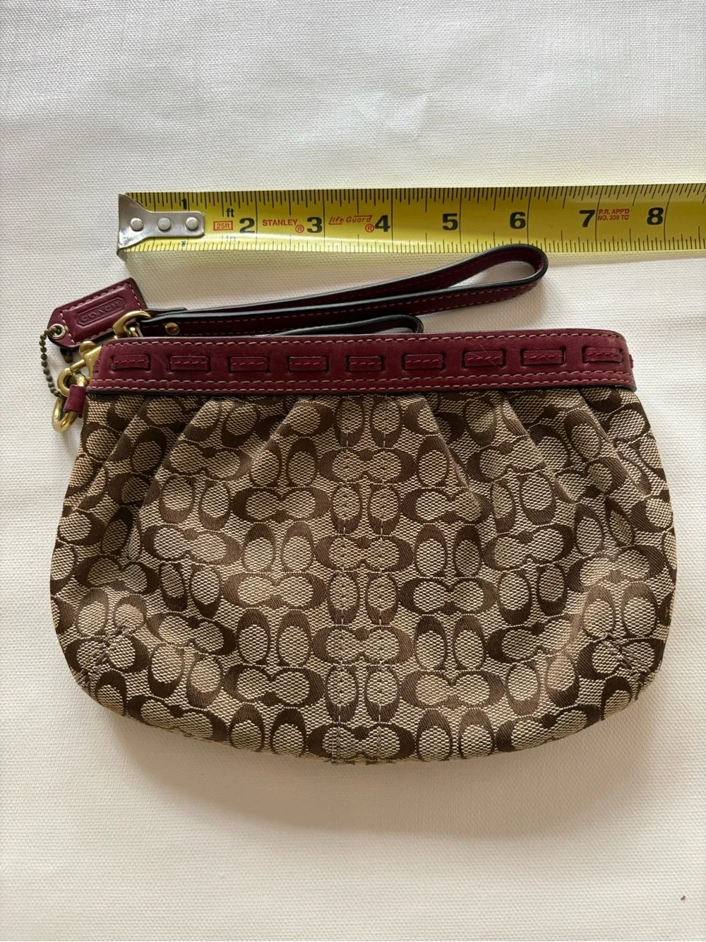 Coach Brown Signature Canvas Wristlet with Burgundy Trim